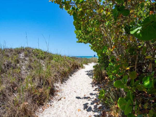 Luxury Holmes Beach Vacation Rental - Anna Maria Island Townhome with Pool & Golf Cart