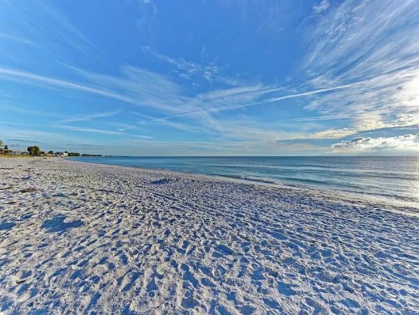 Luxury Holmes Beach Vacation Rental - Anna Maria Island Townhome with Pool & Golf Cart