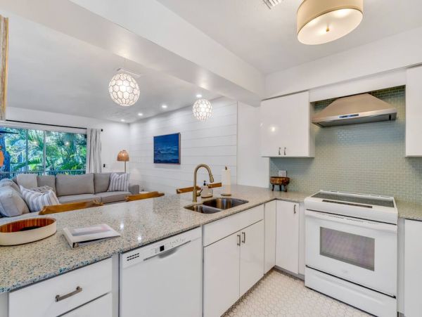 Luxury Holmes Beach Vacation Rental - Anna Maria Island Townhome with Pool & Golf Cart