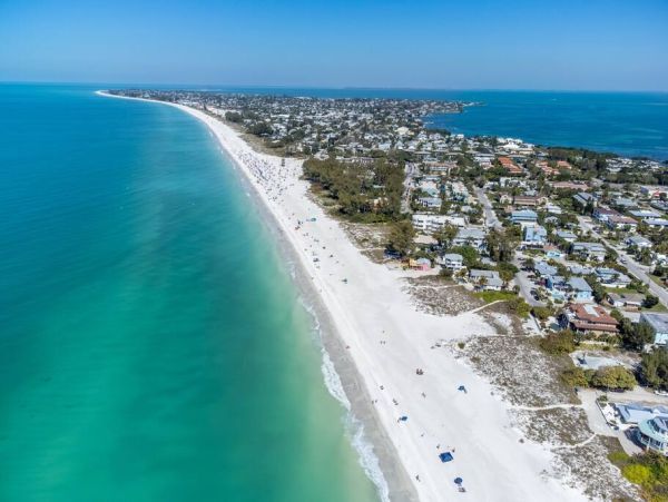 Luxury Holmes Beach Vacation Rental - Anna Maria Island Townhome with Pool & Golf Cart