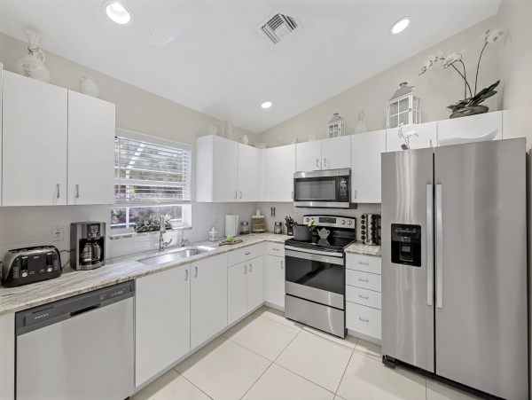 Marco Island Vacation Home Two Bedrooms with Caged Pool