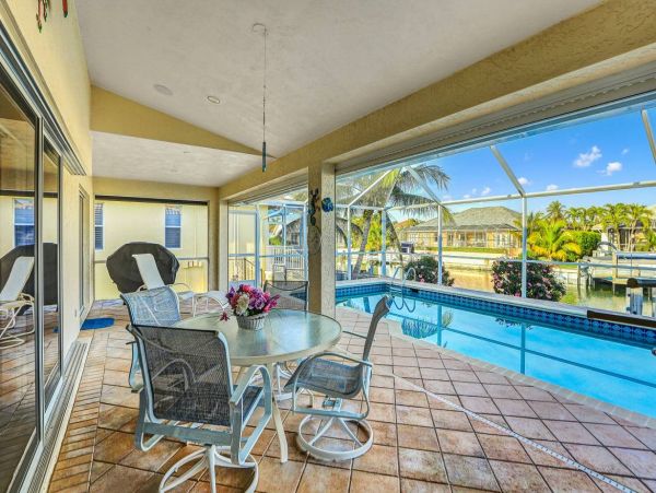 Beautiful Canal Views 3 Bedroom Home with Caged Pool