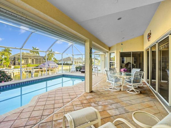 Beautiful Canal Views 3 Bedroom Home with Caged Pool