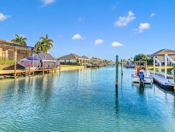 Beautiful Canal Views 3 Bedroom Home with Caged Pool