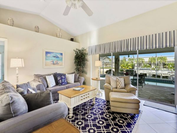 Beautiful Canal Views 3 Bedroom Home with Caged Pool
