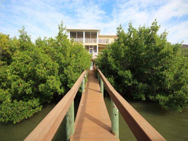 Riverfront Vacation Home in New Smyrna with Two Boat Docks Sleeps 12