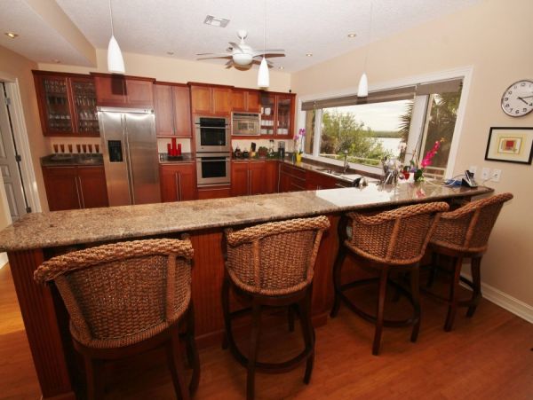 Riverfront Vacation Home in New Smyrna with Two Boat Docks Sleeps 12