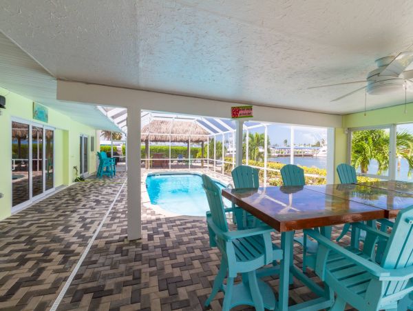 Key Colony Beach Vacation Rental - Florida Keys Waterfront Home with Pool, Dock & Tiki Hut