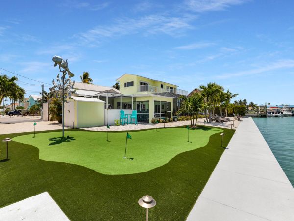 Key Colony Beach Vacation Rental - Florida Keys Waterfront Home with Pool, Dock & Tiki Hut