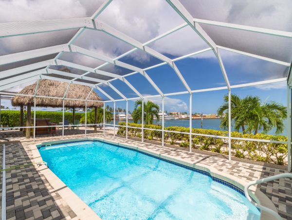 Key Colony Beach Vacation Rental - Florida Keys Waterfront Home with Pool, Dock & Tiki Hut