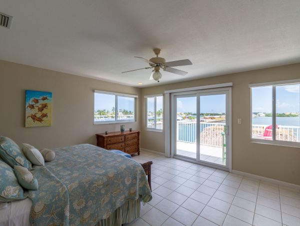 Key Colony Beach Vacation Rental - Florida Keys Waterfront Home with Pool, Dock & Tiki Hut