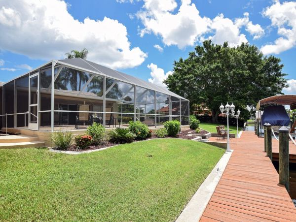 Beautiful Canalfront Three Bedroom Home with Caged Pool