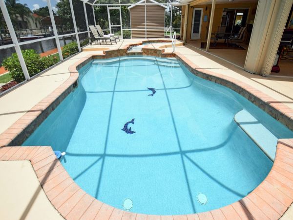 Beautiful Canalfront Three Bedroom Home with Caged Pool