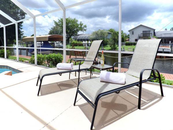 Beautiful Canalfront Three Bedroom Home with Caged Pool