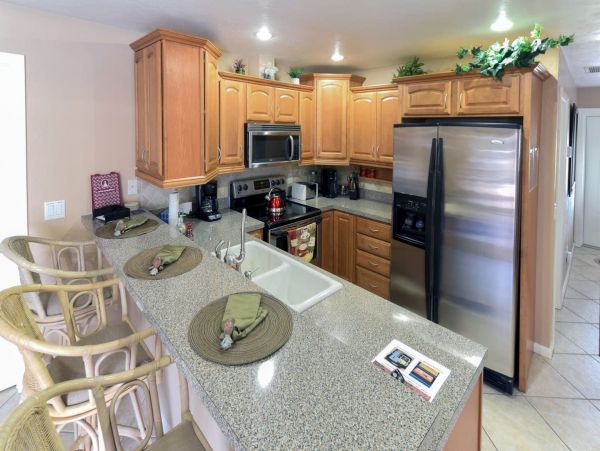 Beautiful Canalfront Three Bedroom Home with Caged Pool