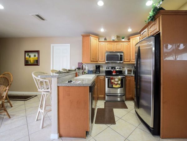 Beautiful Canalfront Three Bedroom Home with Caged Pool