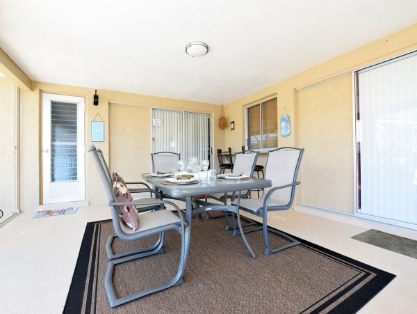 Beautiful Canalfront Three Bedroom Home with Caged Pool