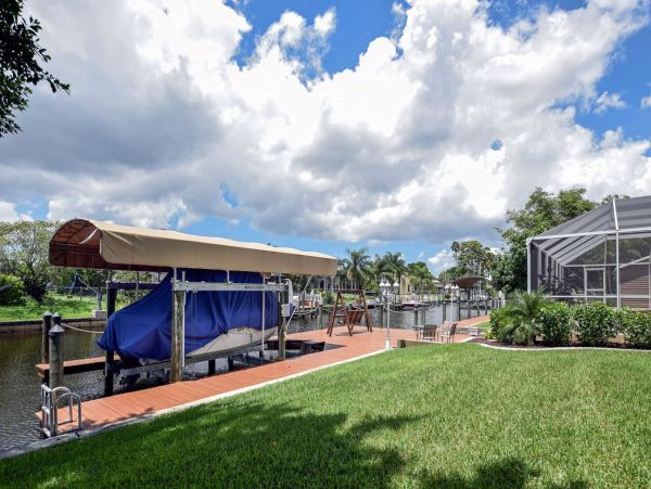 Beautiful Canalfront Three Bedroom Home with Caged Pool