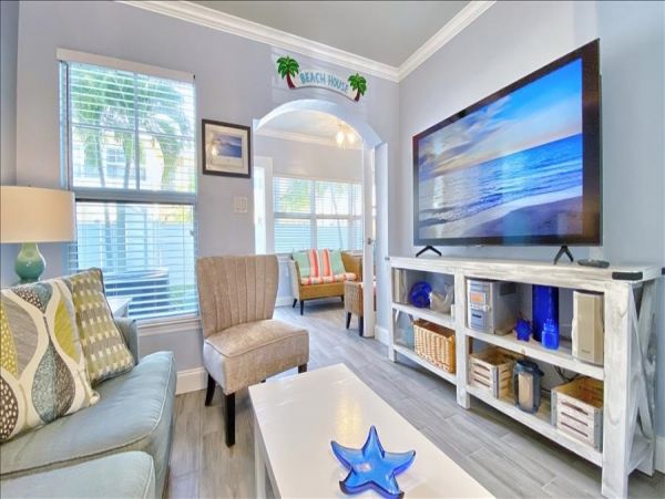 Upscale 1st floor condo with private entrance , patio, pool, washer, dryer & A/C