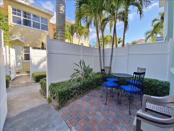 Upscale 1st floor condo with private entrance , patio, pool, washer, dryer & A/C
