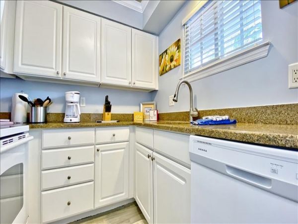 Upscale 1st floor condo with private entrance , patio, pool, washer, dryer & A/C