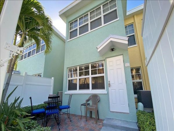 Upscale 1st floor condo with private entrance , patio, pool, washer, dryer & A/C
