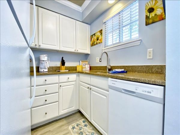 Upscale 1st floor condo with private entrance , patio, pool, washer, dryer & A/C