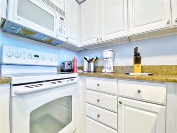 Upscale 1st floor condo with private entrance , patio, pool, washer, dryer & A/C