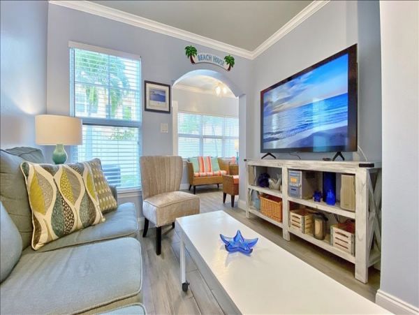 Upscale 1st floor condo with private entrance , patio, pool, washer, dryer & A/C
