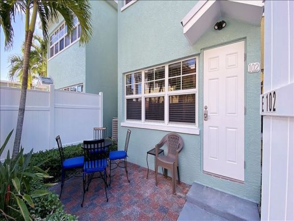 Upscale 1st floor condo with private entrance , patio, pool, washer, dryer & A/C