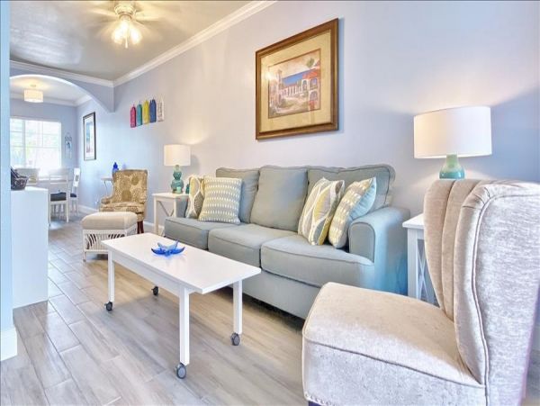 Upscale 1st floor condo with private entrance , patio, pool, washer, dryer & A/C