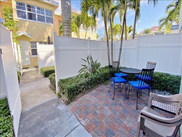 Upscale 1st floor condo with private entrance , patio, pool, washer, dryer & A/C