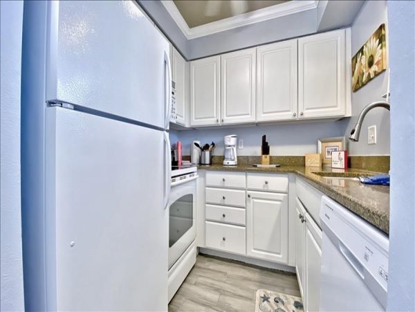 Upscale 1st floor condo with private entrance , patio, pool, washer, dryer & A/C