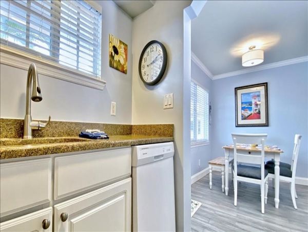Upscale 1st floor condo with private entrance , patio, pool, washer, dryer & A/C