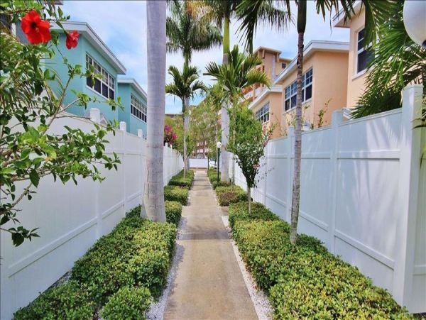 Upscale 1st floor condo with private entrance , patio, pool, washer, dryer & A/C