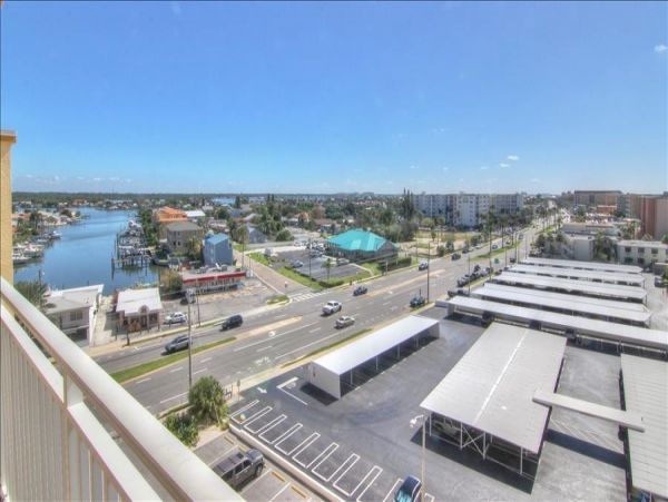Beachfront Condo with private balcony , views, heated pool , hot tub & AC