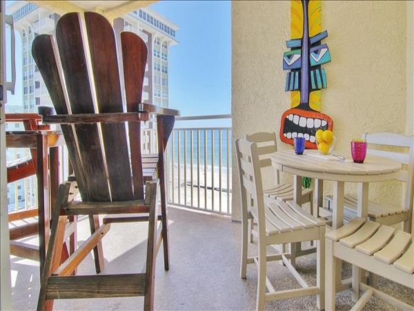 Beachfront Condo with private balcony , views, heated pool , hot tub & AC