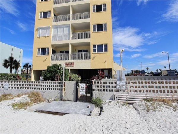 Beachfront Condo with private balcony , views, heated pool , hot tub & AC