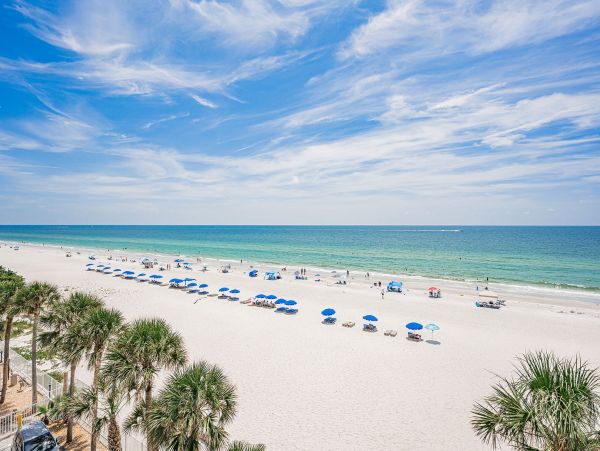 Gulf Front Vacation Rental - Family Friendly Condo with Pool & Balcony