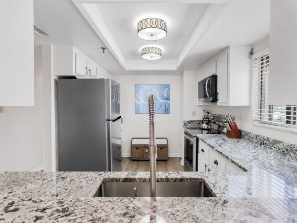 Gulf Front Vacation Rental - Family Friendly Condo with Pool & Balcony