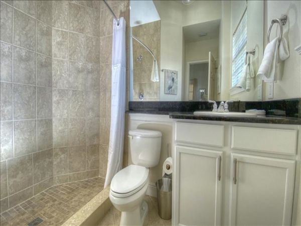 3 Bedroom -3 Bathroom Condo with Water Views short walk to restaurants and beach