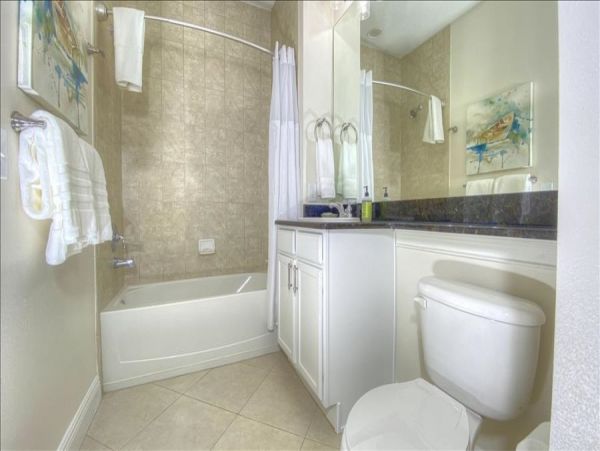 3 Bedroom -3 Bathroom Condo with Water Views short walk to restaurants and beach