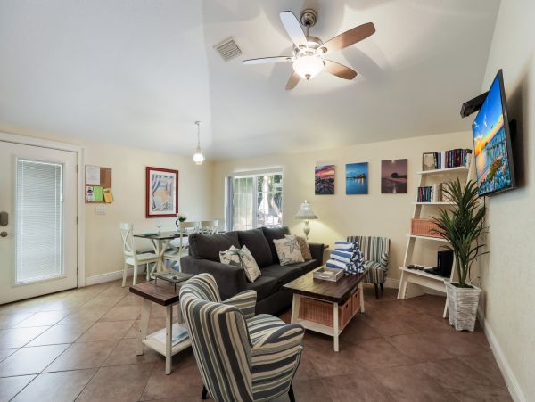 Remodeled Duplex with private pool 1/2 block to beach with a Golf Cart
