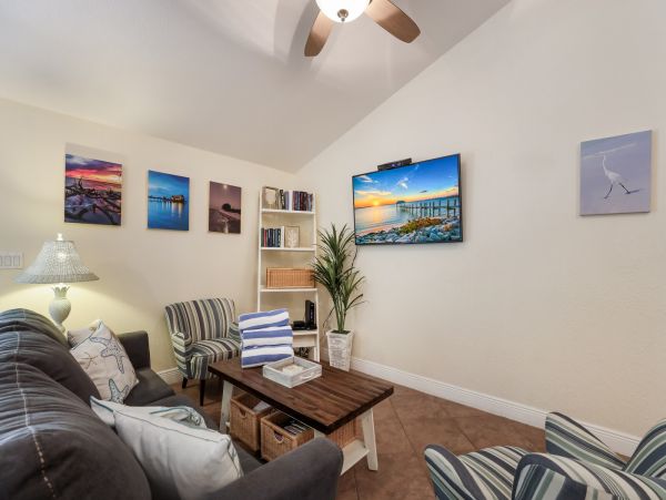 Remodeled Duplex with private pool 1/2 block to beach with a Golf Cart