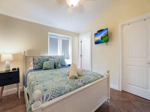 Remodeled Duplex with private pool 1/2 block to beach with a Golf Cart