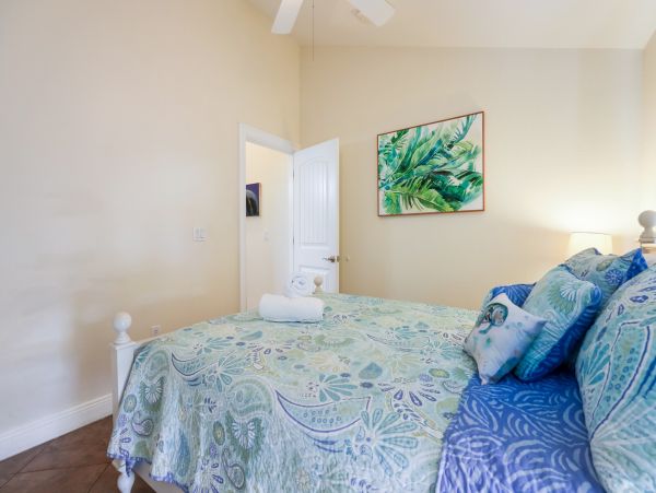 Remodeled Duplex with private pool 1/2 block to beach with a Golf Cart