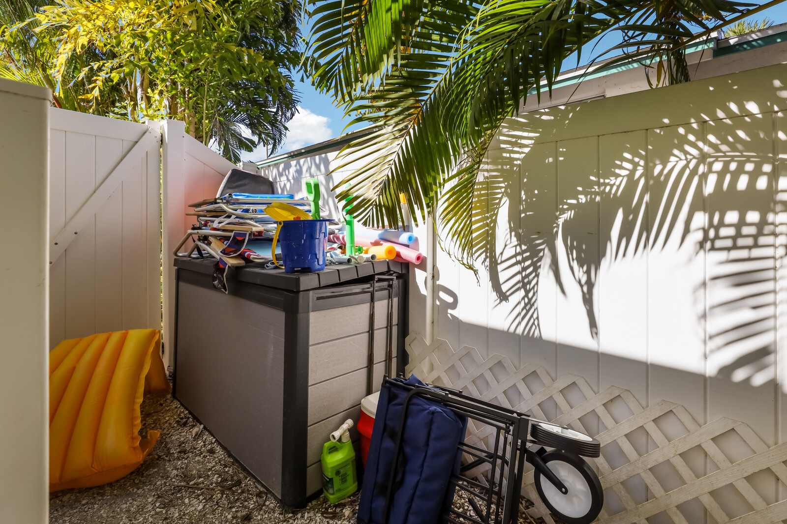 Remodeled Duplex with private pool 1/2 block to beach with a Golf Cart