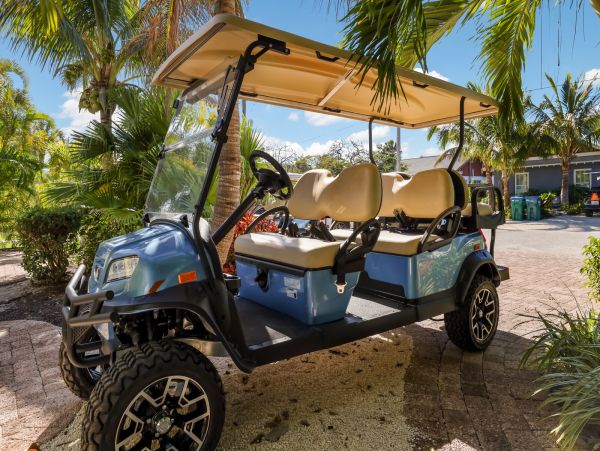 Remodeled Duplex with private pool 1/2 block to beach with a Golf Cart