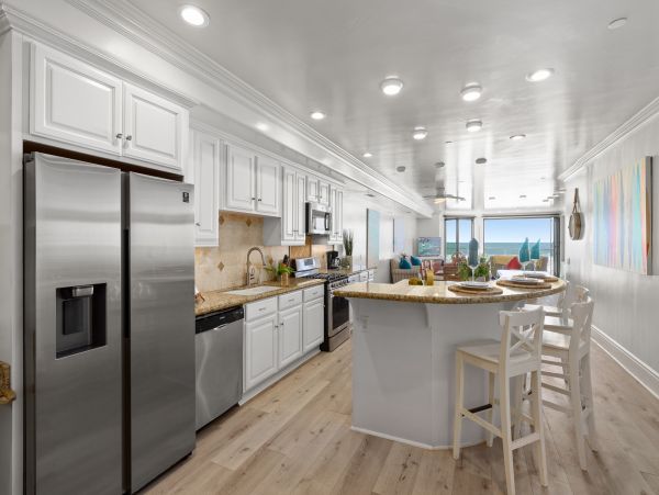 On Beach Oceanside Vacation Condo Five Bedroom