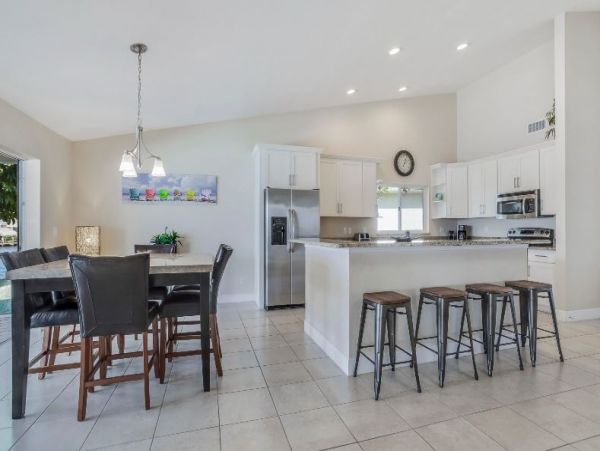 Canal View Cape Coral Vacation Home Caged Pool Sleeps 8
